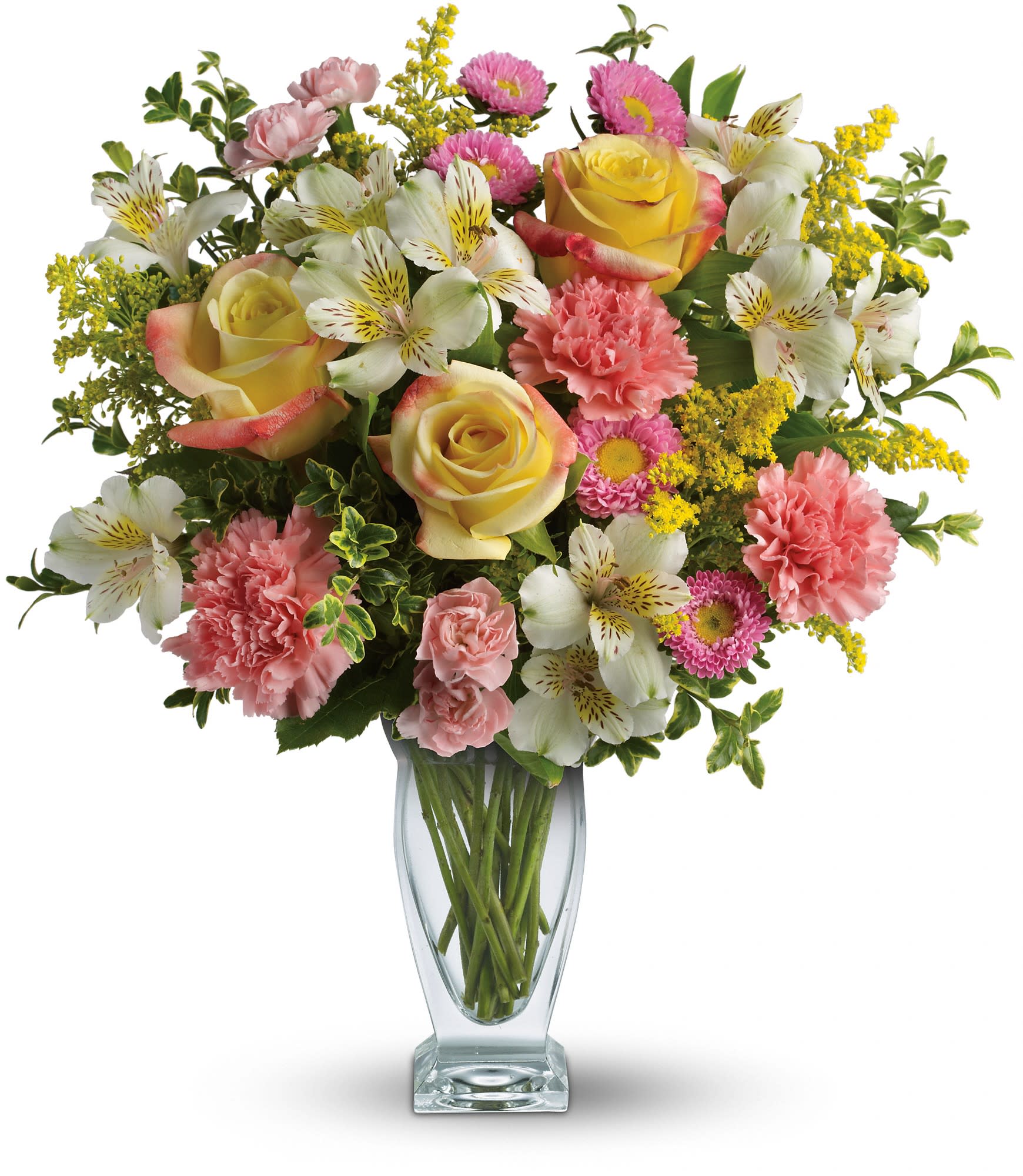 Mixed bouquet of roses, carnations, and alstroemeria in a clear glass vase