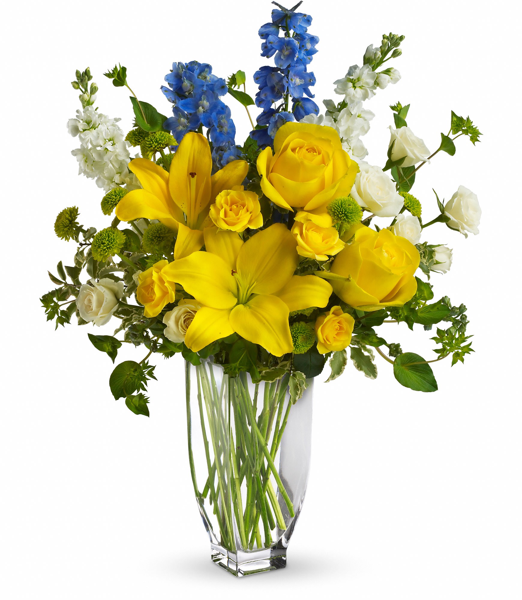 Yellow lilies and roses with blue and white flowers in a clear vase