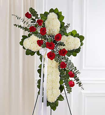 Standing floral cross with red roses and white chrysanthemums