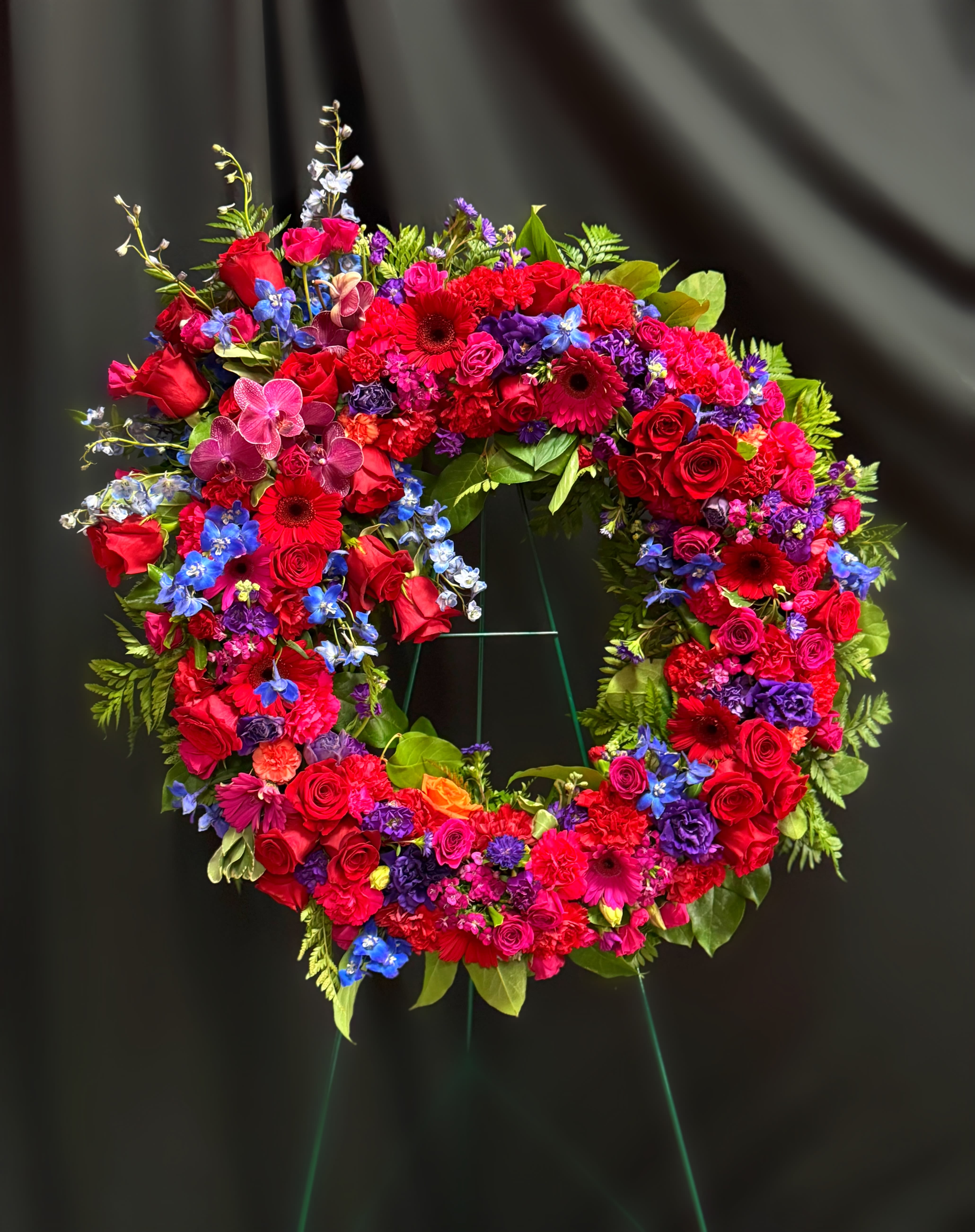 Infinite Love wreath - This beautiful wreath stands as a testament to the circle of life that must be acknowledged even in our saddest moments. It will surely be appreciated by all in attendance. 