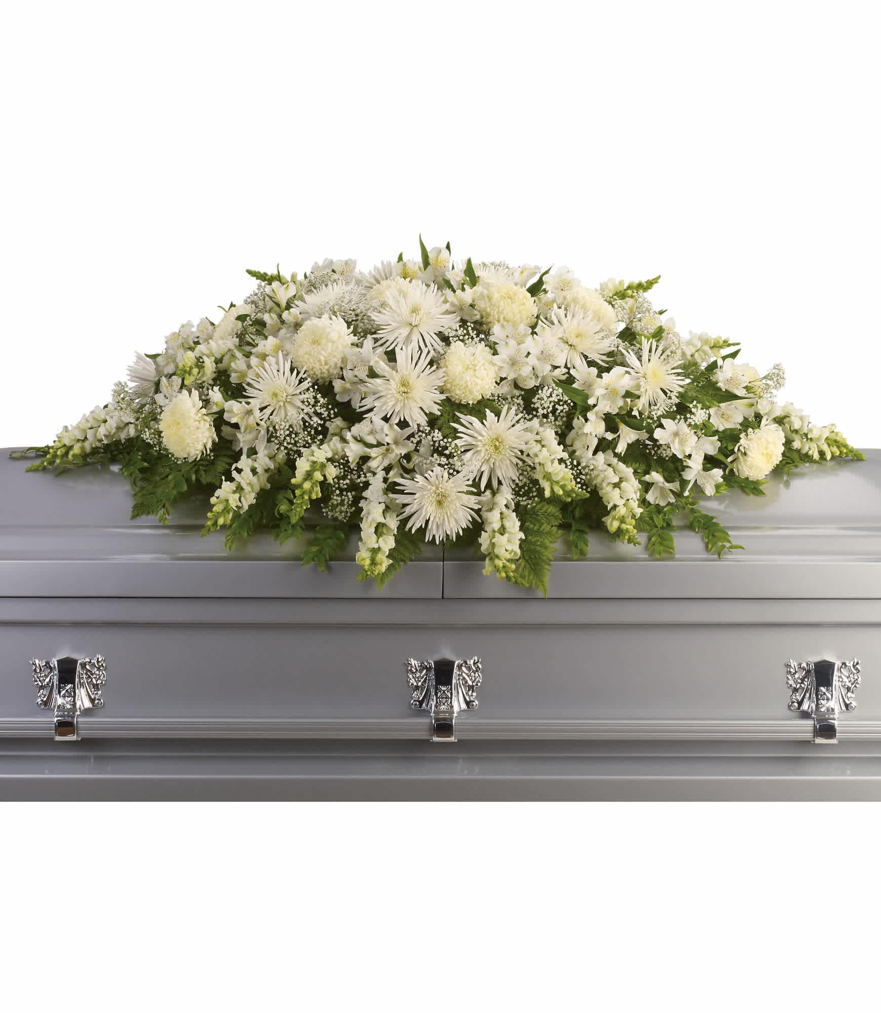White floral casket spray with chrysanthemums and lilies