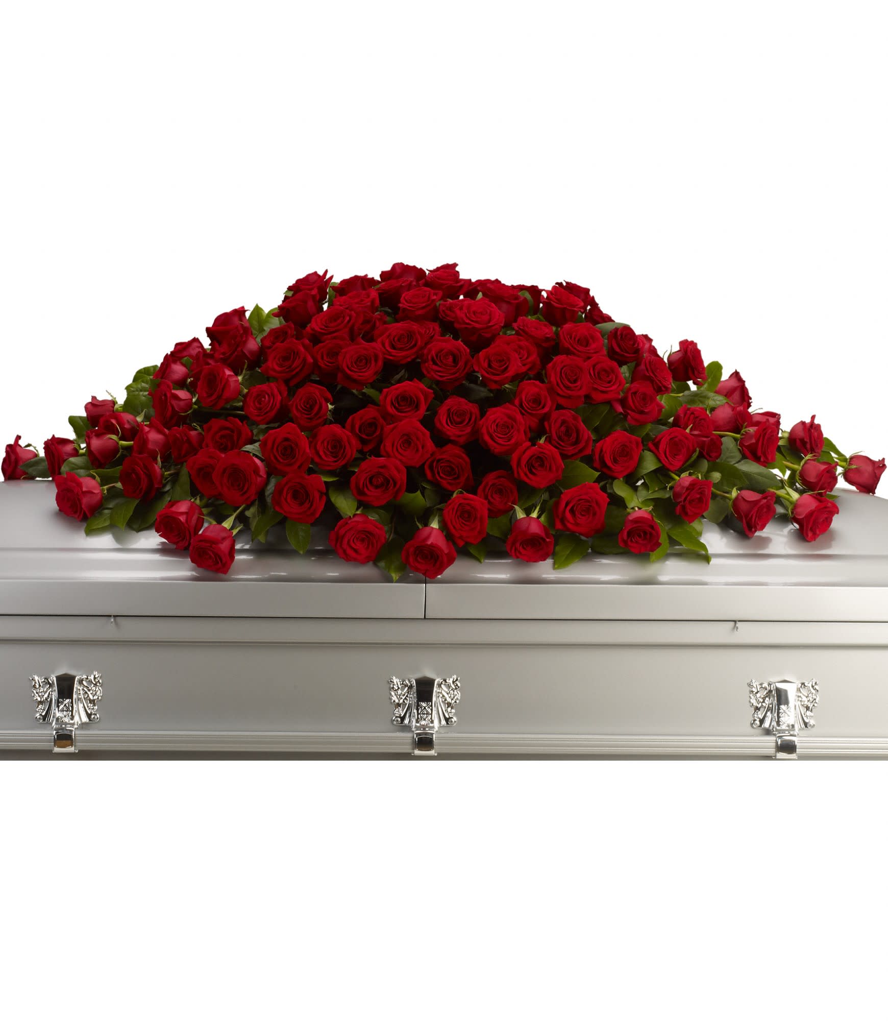 Red roses arranged on top of a silver casket