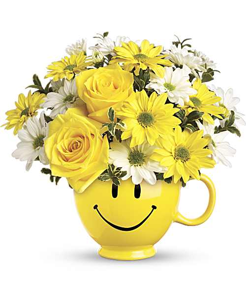 Be Happy Bouquet - Make someone smile with this cheerful mix of yellow roses, yellow and white daisy spray chrysanthemums, and oregonia - delivered in our iconic yellow Be Happy® Mug. It's a bright pick-me-up for anyone, from a loved one to a coworker-and even perfect for kids! Orientation: One-Sided