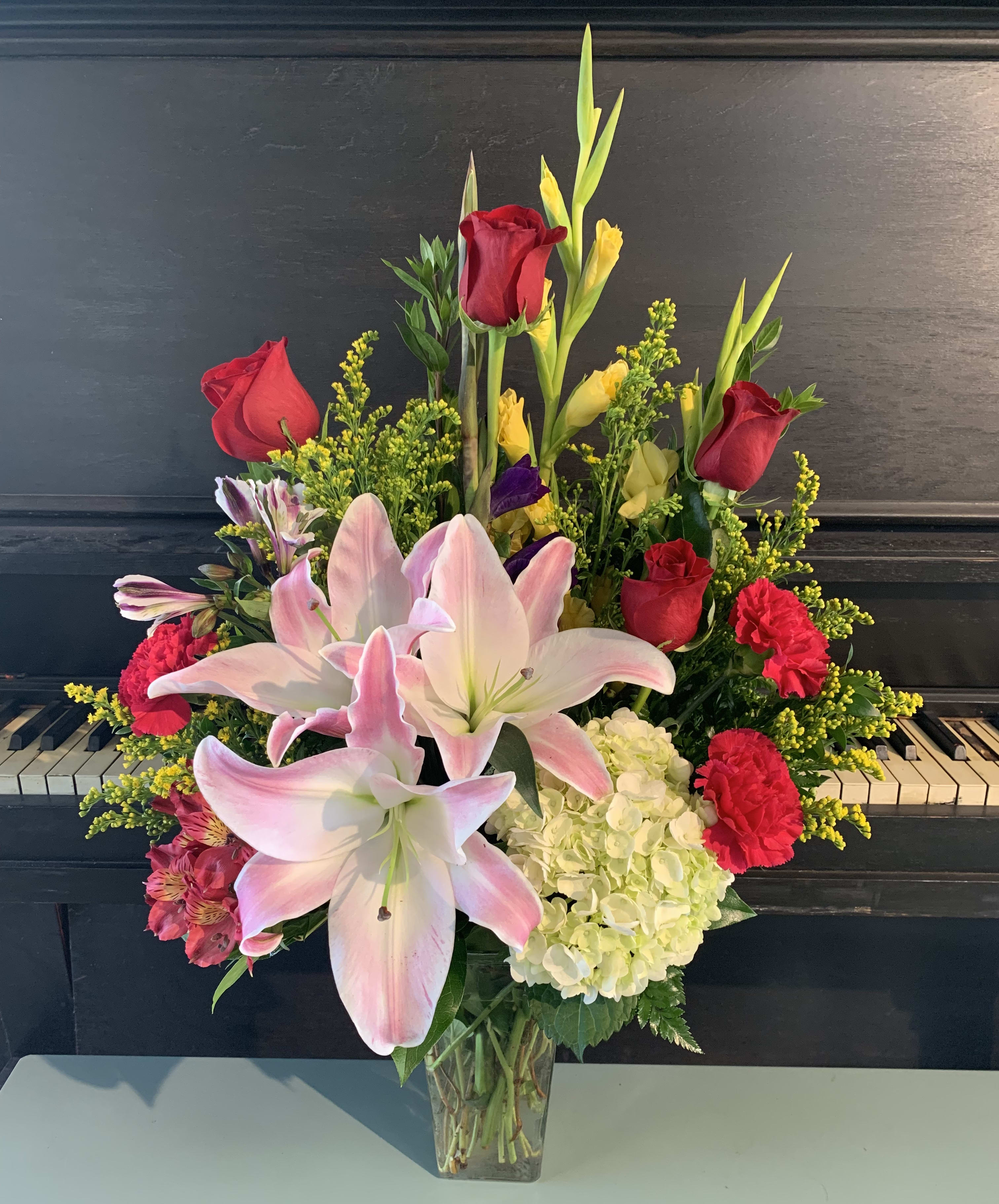 Brighten Your Day  -  A colorful mixture of flowers to brighten up someone’s day, for sure. 