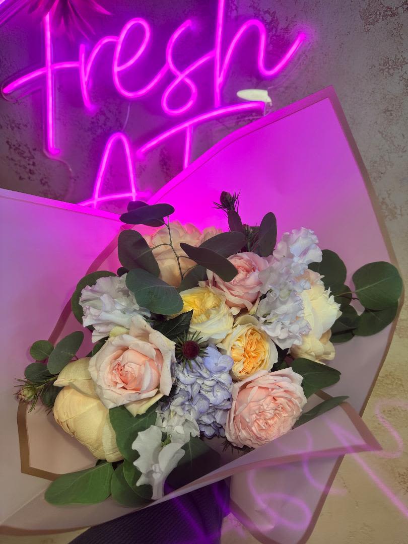 Congrats are in Order - This wrapped bouquet is the perfect way to give Congratulations! Graduates and Retirees alike will love to be gifted one our designer wraps! Custom colors available upon request. (This item is available for pick up only) 