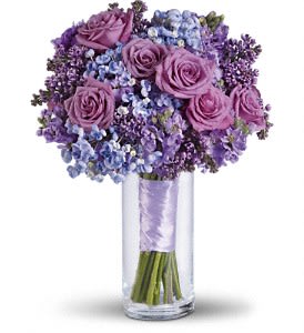 Lavender Heaven Bouquet - Fall in love with this lavender bouquet and its luscious mix of texture and fragrance.  Lavender lilacs, roses and stock contrast beautifully with blue stems of popcorn hydrangea.  Approximately 11 1/2" W x 15" H  Orientation: N/A