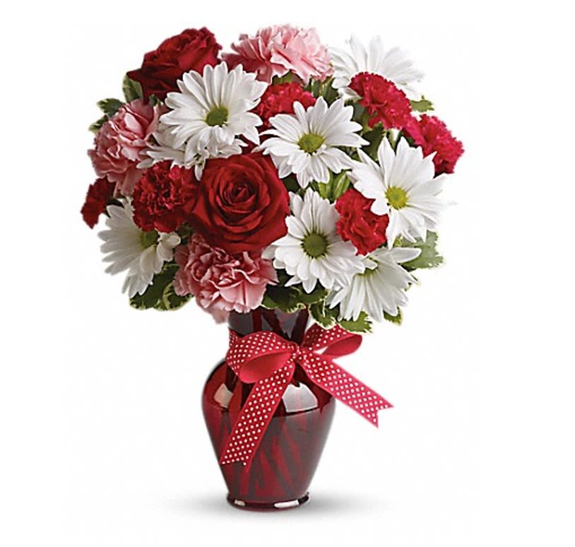 Hugs and Kisses Bouquet with Red Roses - Whether for your significant other or your sister, aunt or grandmother, this delightful floral gift is a sweet way to say "I love you." Sweet price, too. The charming bouquet includes white daisy spray chrysanthemums, pink carnations, red miniature carnations and red roses accented with fresh greenery.  One sided - Aproximately 15" tall