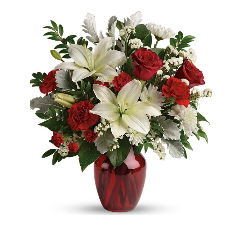 Visions of Love Bouquet - A vision of love! This luxe bouquet of fragrant white lilies and radiant red roses, hand-delivered in a ruby vase, is the perfect expression of your feelings. 