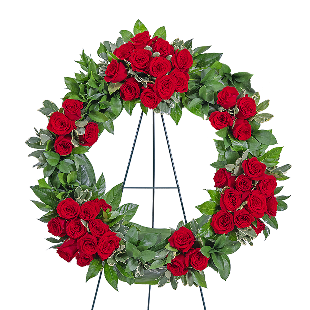 Red rose wreath on a metal stand