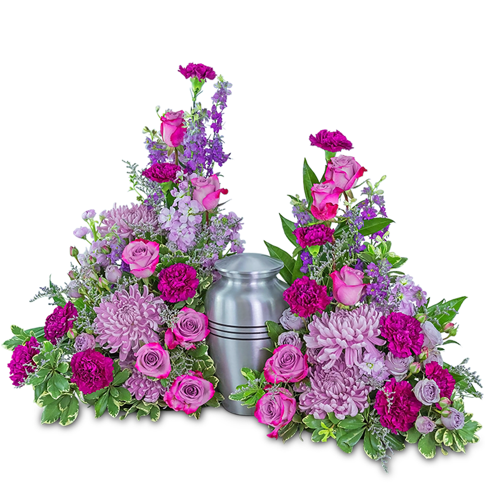 Two pink and purple floral sprays flank a silver urn
