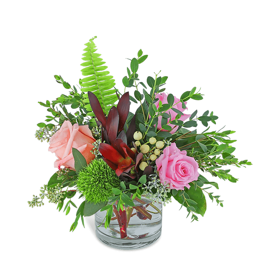 Purely Natural - Purely Natural is long-lasting and overflowing with natural beauty! It is a full and lush design that features Leucadendron, soft peach and pink roses, hypericum berry, and premium foliage. A gift of hand-arranged flowers will be sure to impress or add a beautiful elegance to the recipient's home or office space.