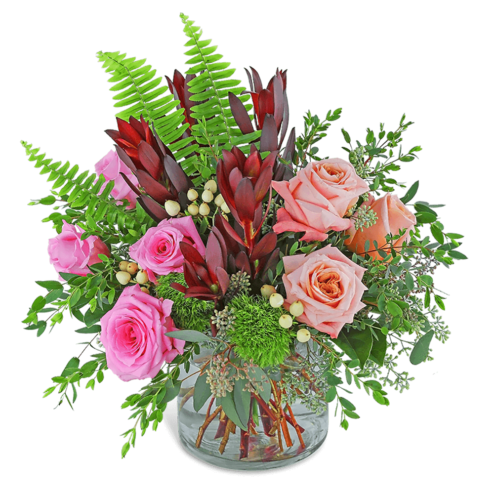 Natural Abundance - Natural Abundance is long-lasting and overflowing with natural beauty! It is a full and lush design that features leucadendron, soft peach and pink roses, hypericum berry, and premium foliage. A gift of hand-arranged flowers will be sure to impress or add a beautiful elegance to the recipient's home or office space.