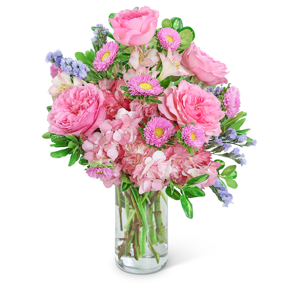 Pink mixed bouquet in a clear glass vase