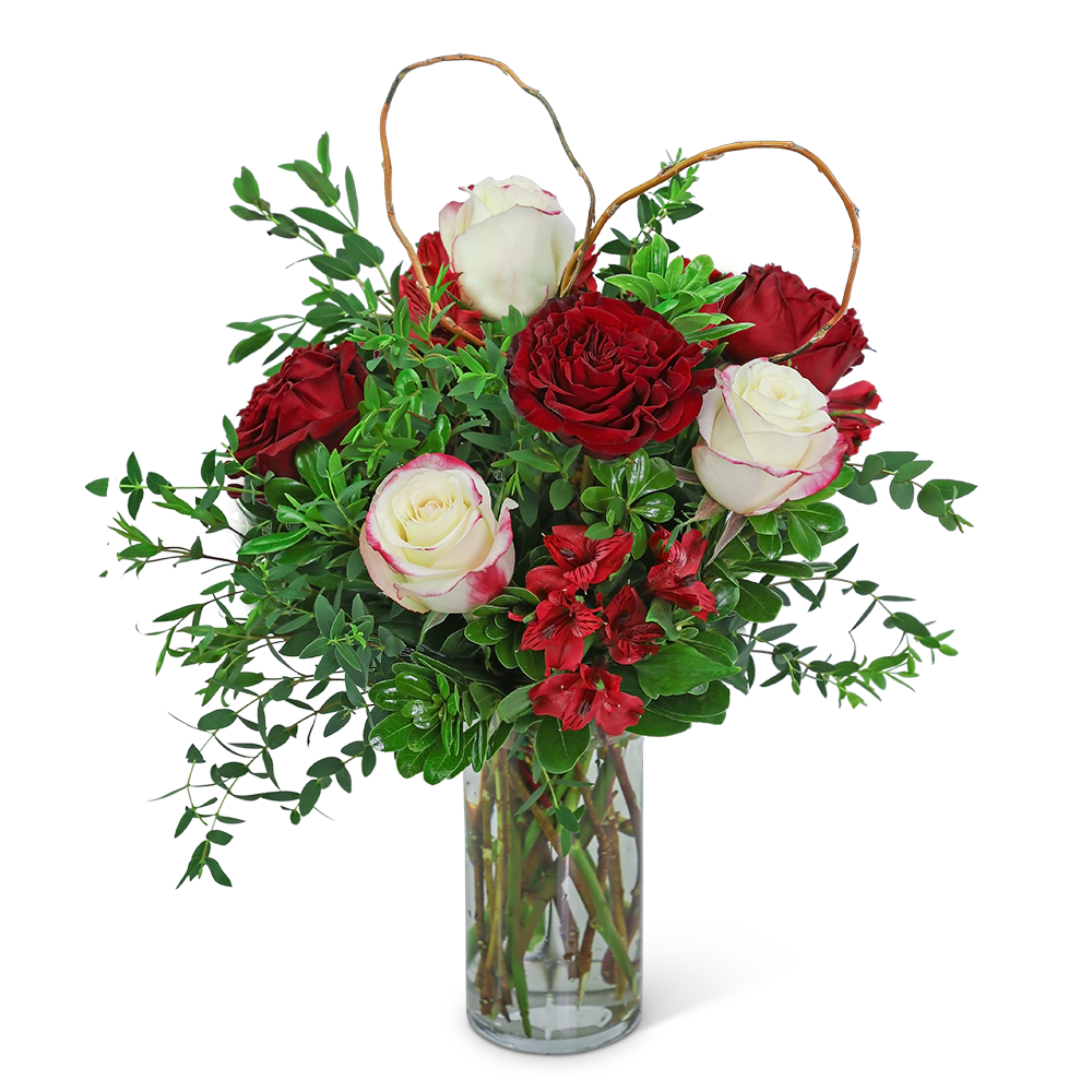 Road to Romance - This gorgeous design is hand-arranged by our professional floral designers and delivered in a lovely vase. The rich, romantic colors of Road to Romance are sure to melt the heart of your loved one. Beautiful ruffly roses, alstroemeria, and premium foliage are artfully arranged with a natural heart accent nestled in. Flower delivery has never been easier or more appreciated. Whether you are looking for a birthday, anniversary, or valentines day gift, we have flowers that are sure to fit the occasion!