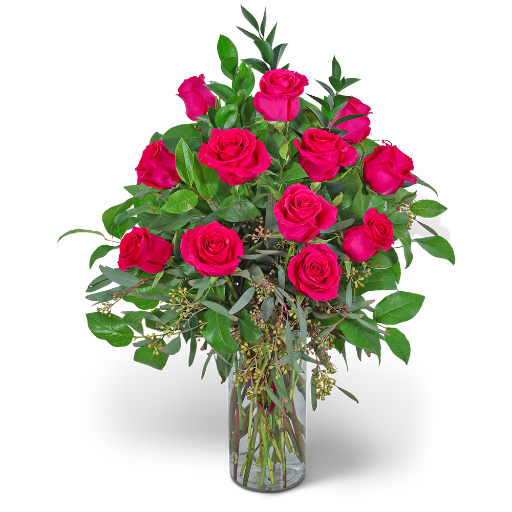Pink roses arranged in a clear glass vase