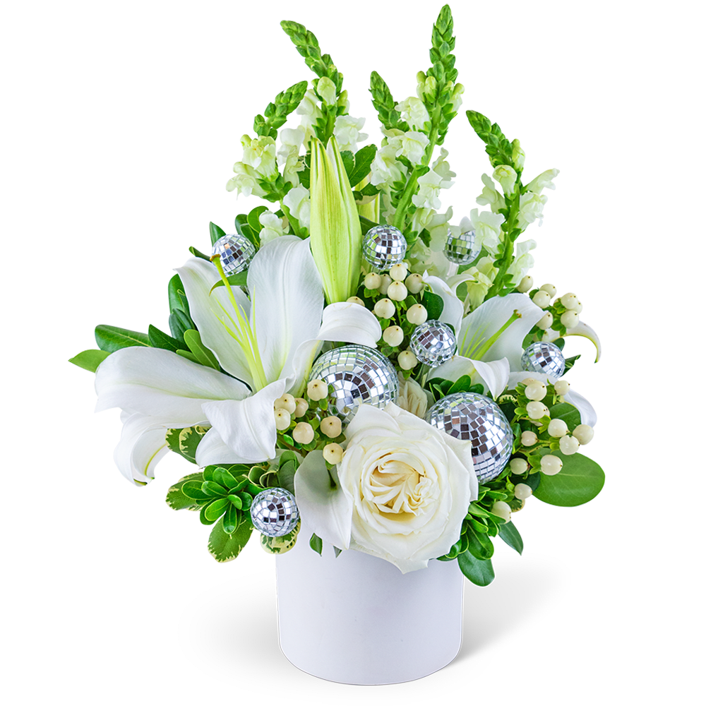 White lilies and roses in a white vase with silver disco ball accents