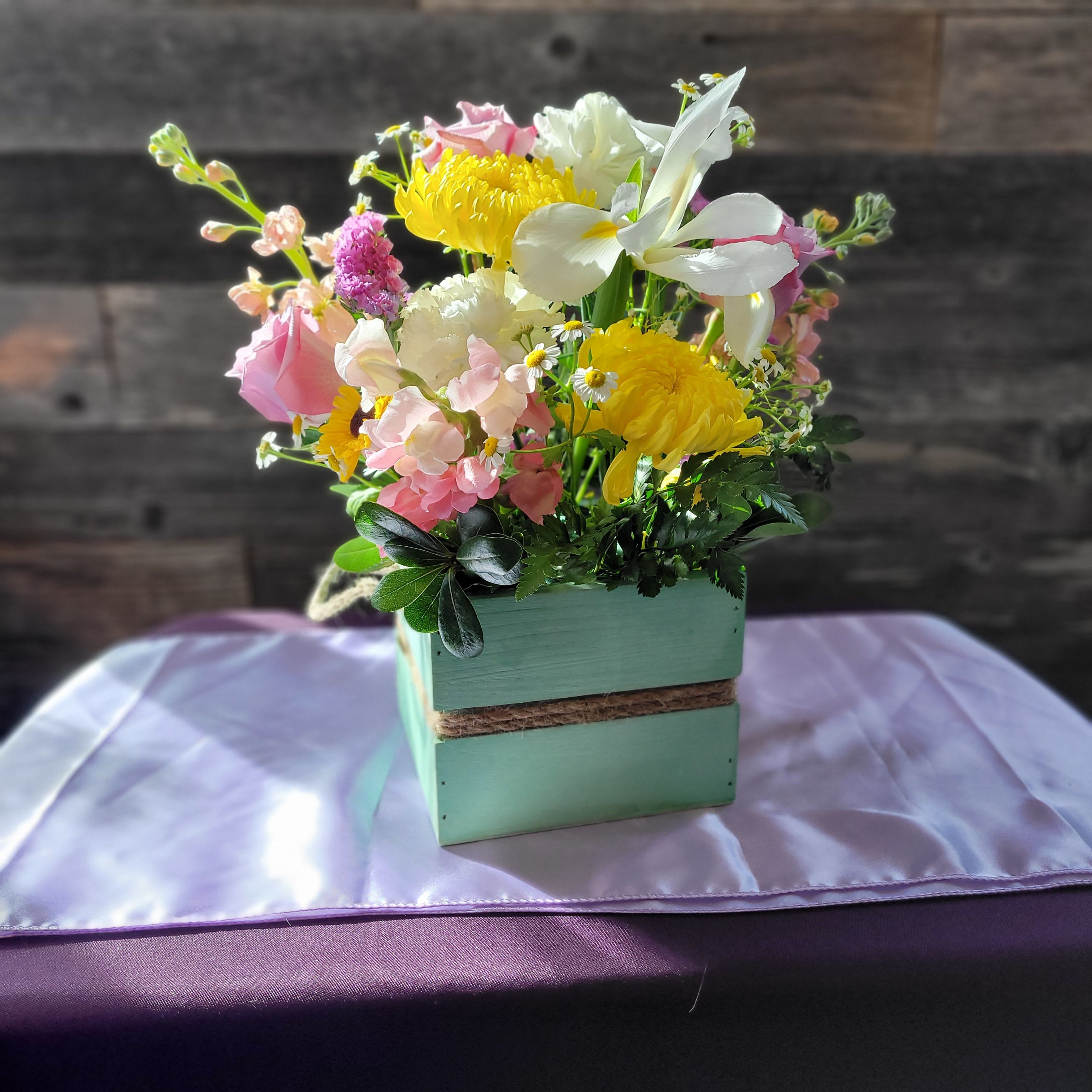 Sweet Meadow - Soft pastels and sunny yellows in a rustic box—fresh, bright, and feel-good.