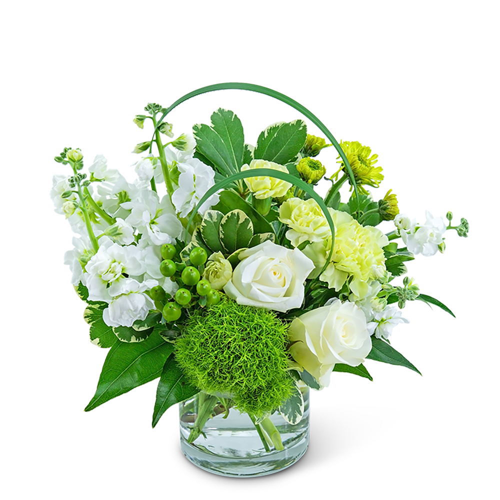 White and yellow floral arrangement in a glass vase