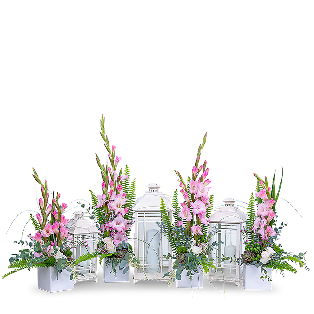 Pink floral arrangements with white lanterns