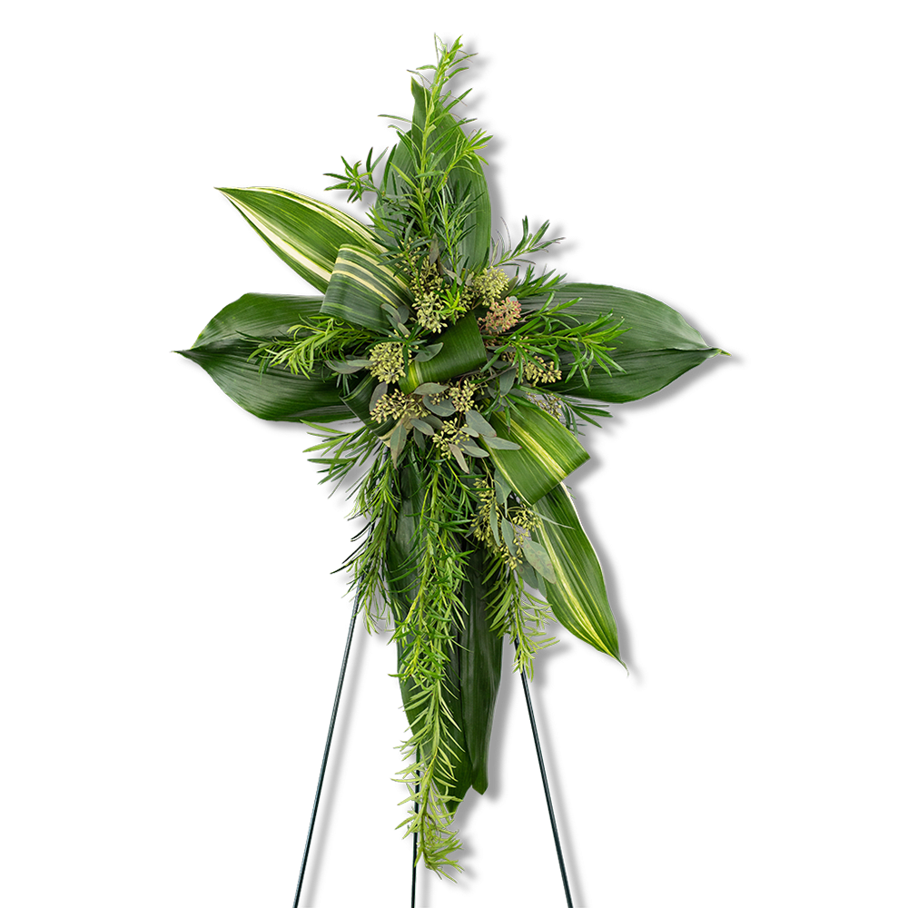Green floral standing cross on an easel