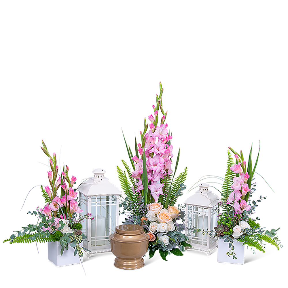 Pink floral sprays with white lanterns and a bronze urn