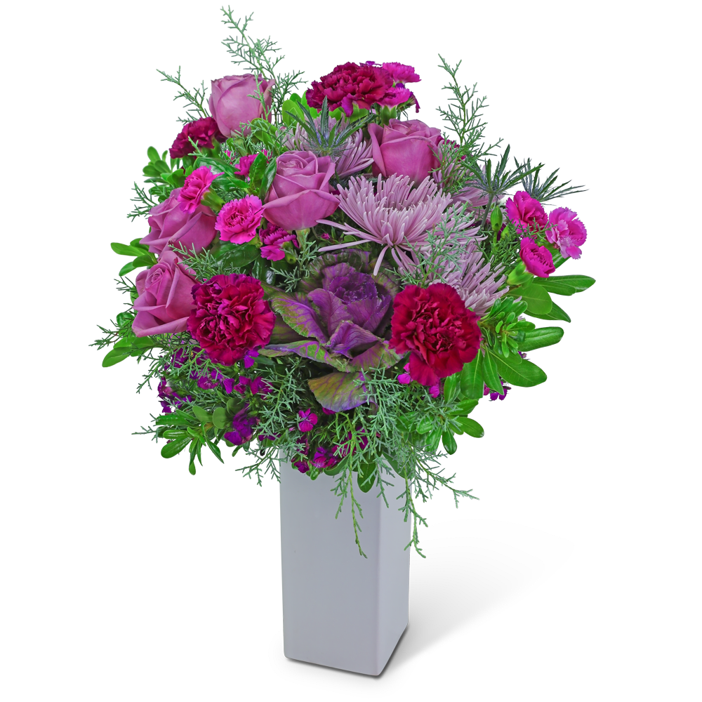 Pink roses and magenta carnations in a white vase
