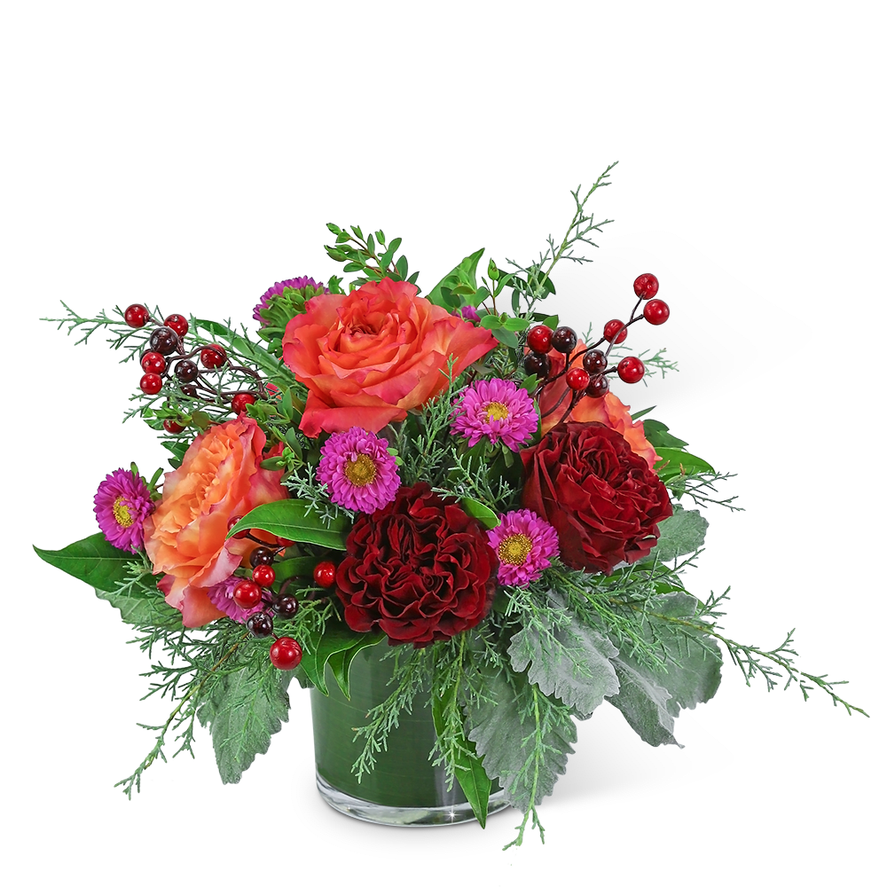 Bouquet of red and orange roses with purple daisies in a glass vase