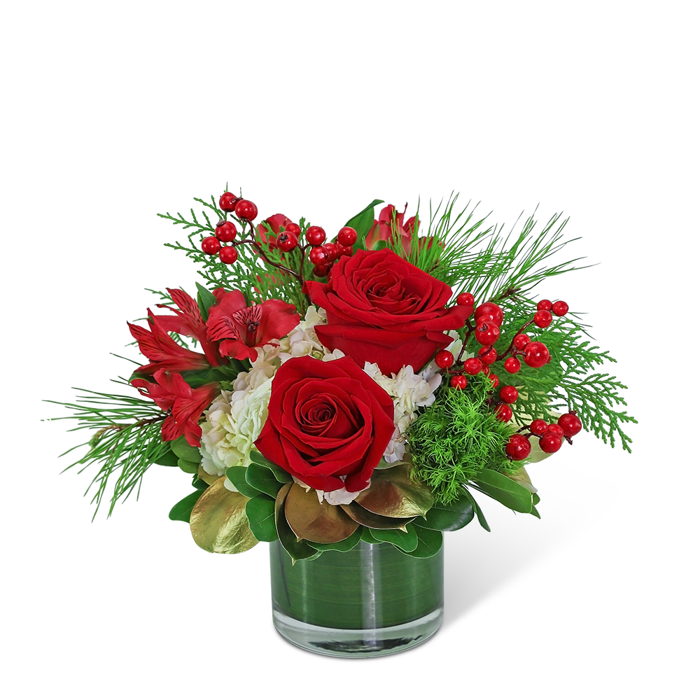 Red roses and red flowers in a glass vase with berries
