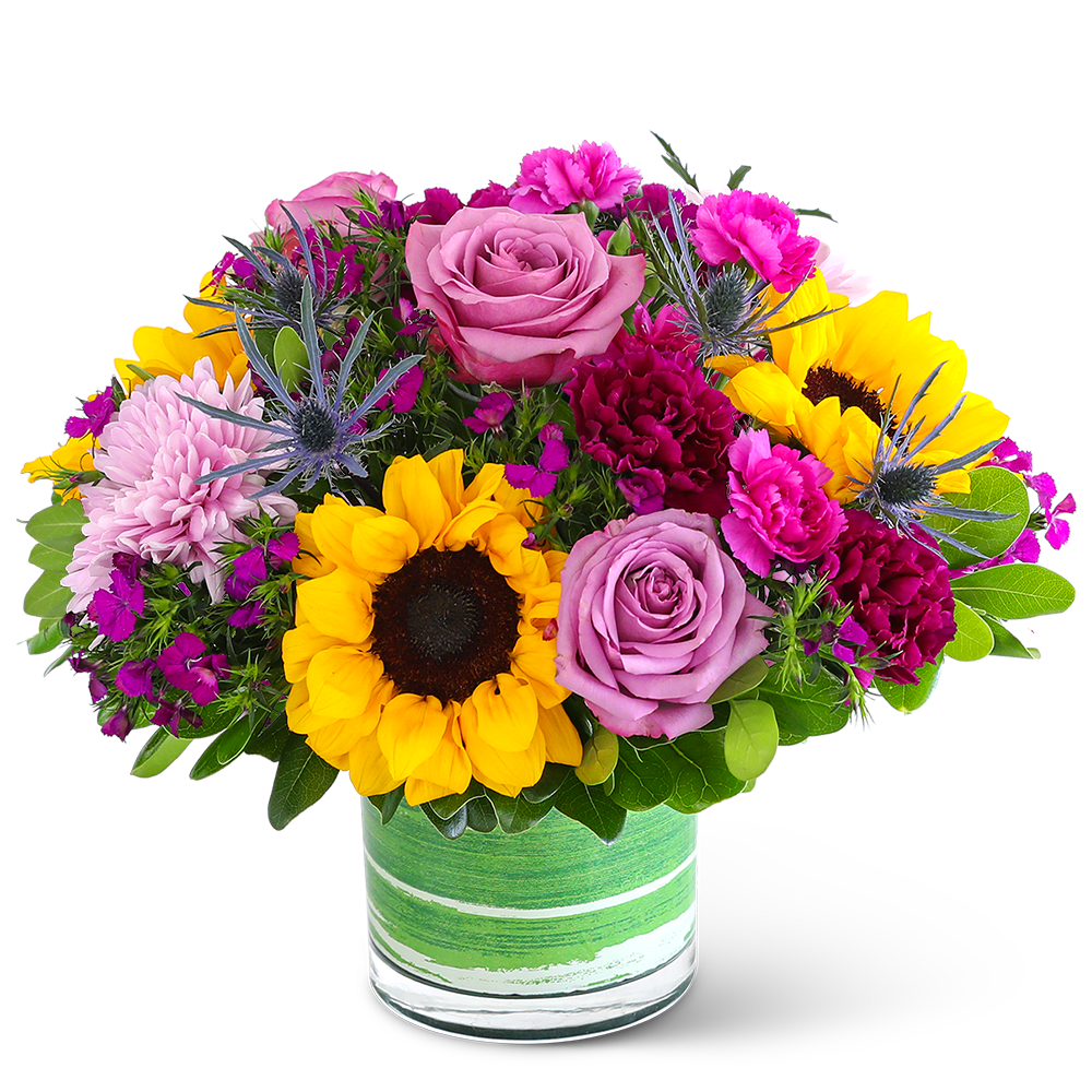 Mixed bouquet with sunflowers, pink roses, and carnations in a glass vase