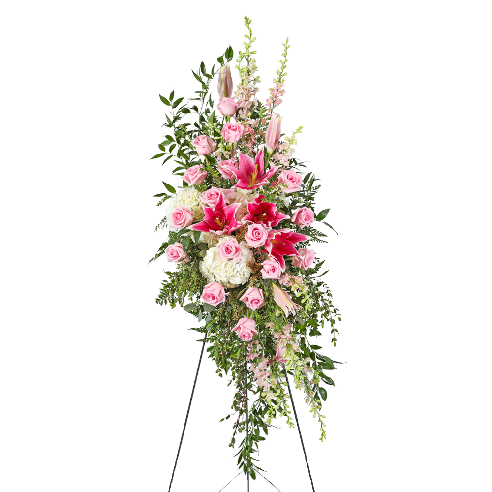 Tall pink and white floral standing spray on an easel
