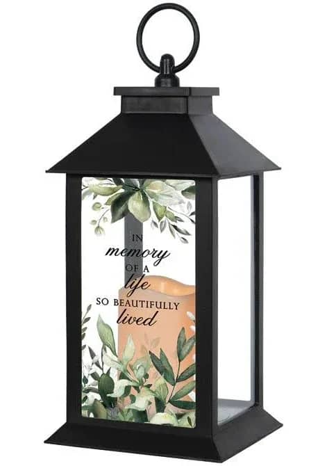 Lantern - Beautiful Life - These lanterns are made of weather friendly materials and UV printed glass. They include a flameless LED candle with a built-in automatic timer: 6hrs ON/18hrs OFF. They are suitable for hanging or free-standing use.  W: 5.5" H: 13" D: 5.5"  