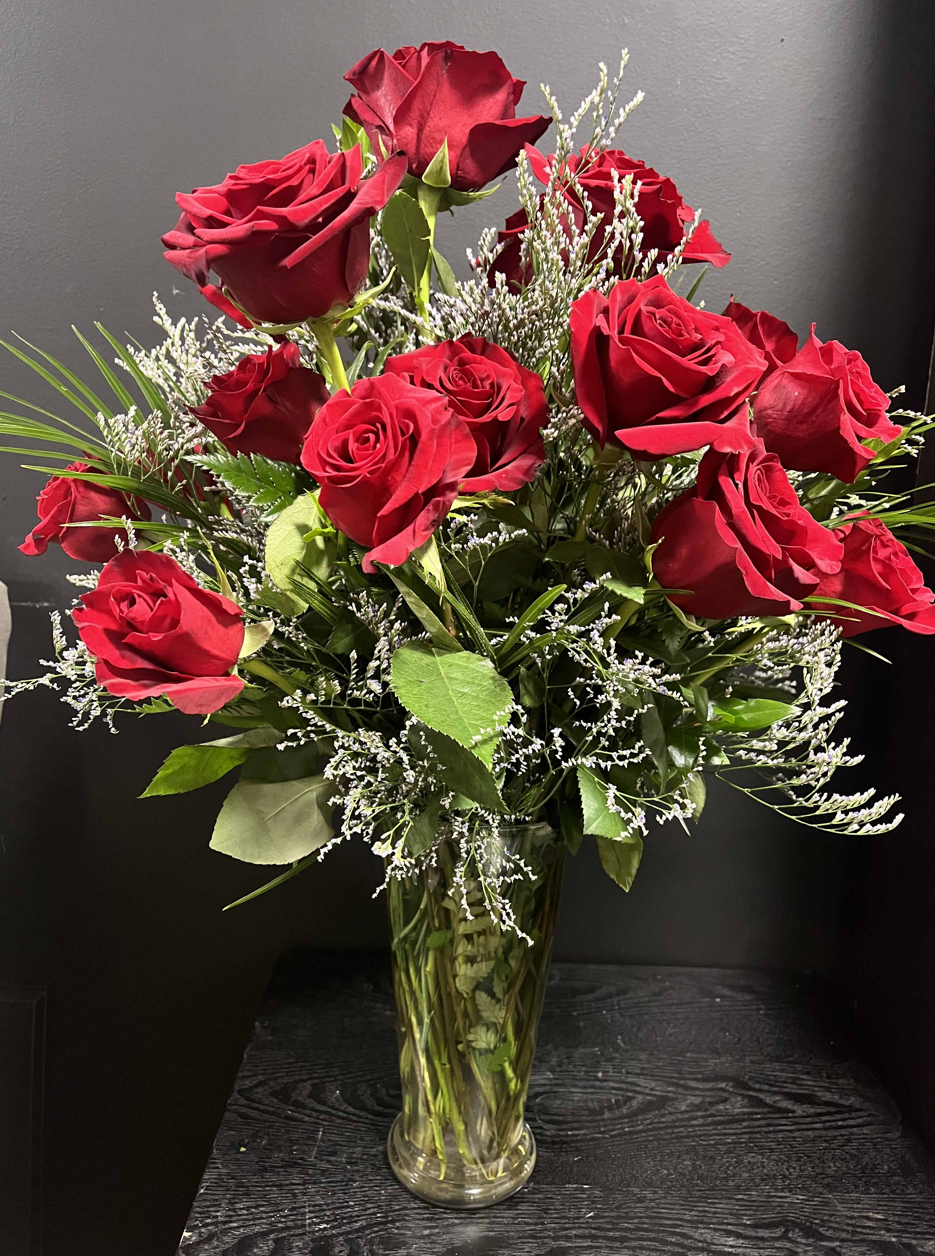 Exploding with Love   - 2 doz red roses provides the classic romantic gift. It's perfect for Valentine's Day or an Anniversary. APPROXIMATE DIMENSIONS: 30" H X 22" W