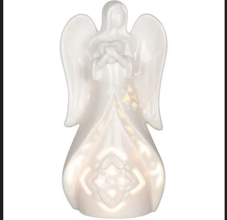 Angel light figurine - 9.5 in tall porcelain angel.  Light bulb included