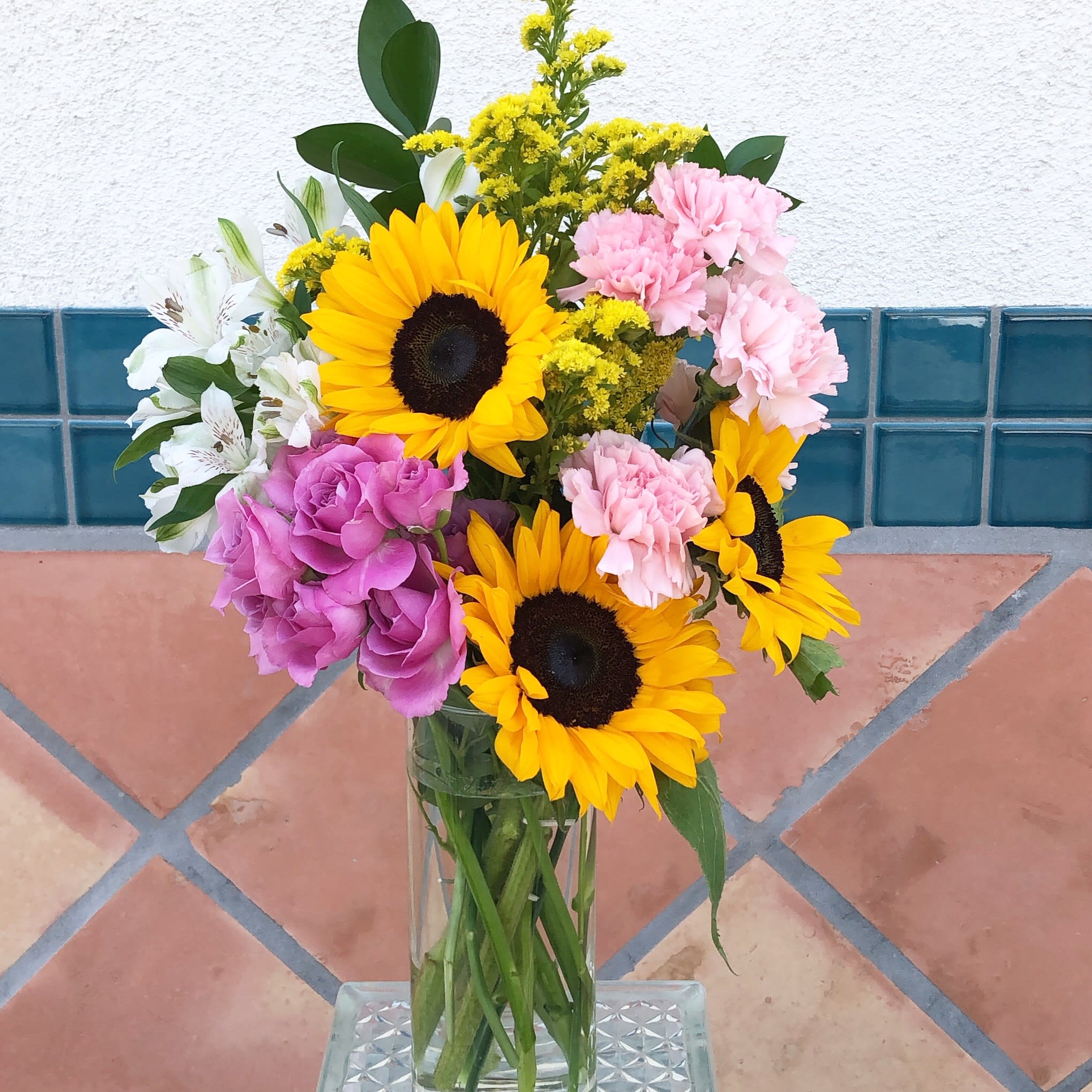 Bright and Cheerful bouquet - Sending a happy bouquet with sunflowers, carnation, spray roses, and alstromeria to brighten someone's day. 