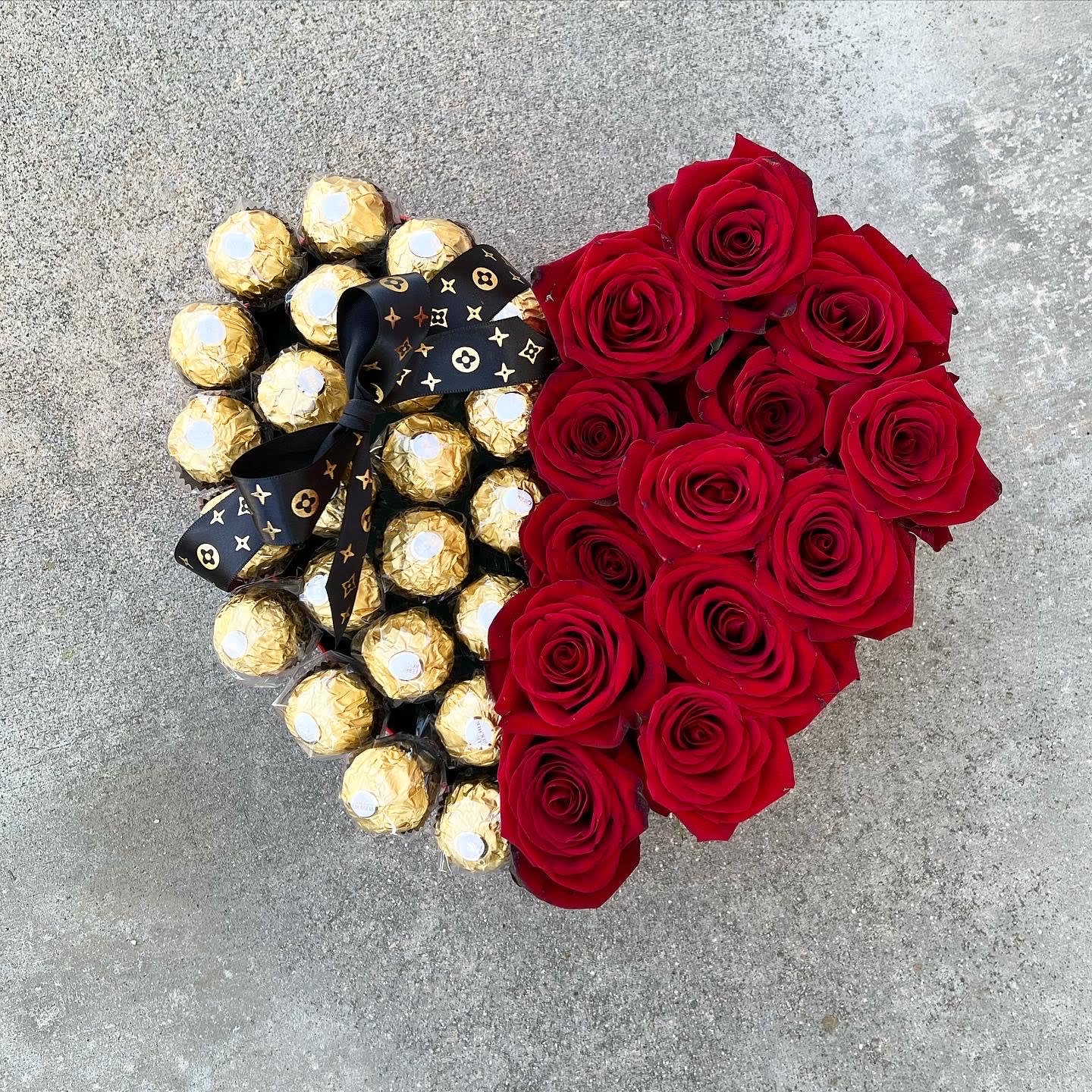 Be My Valentine - Fresh red roses and chocolate in a heart box (black or red color box). Perfect gift for Valentines.   The heart box come in Red and Black color. One of the color will be used to fill your order.