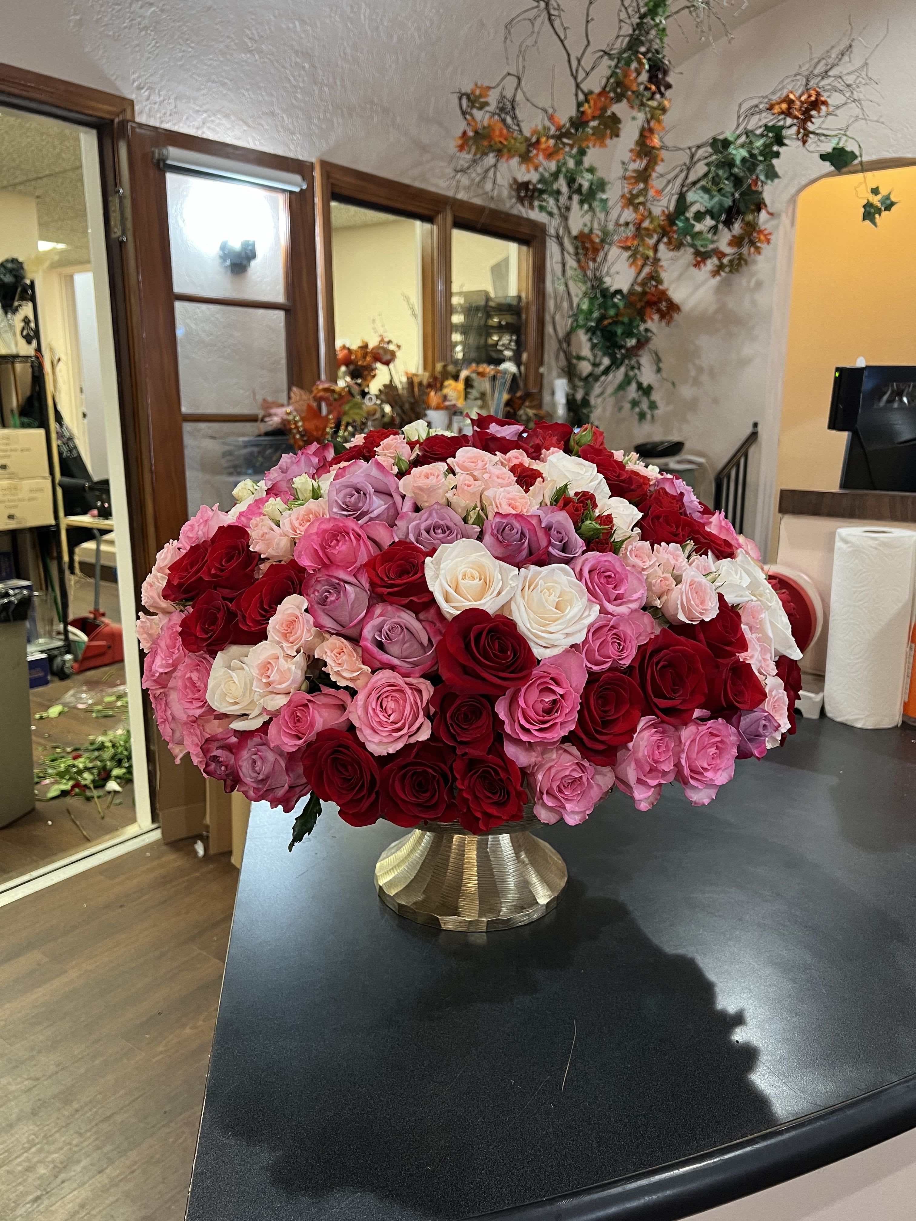 Forever in my heart - Large rose bowl with over 20 roses in red, pink, white, lavender.