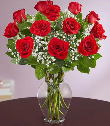 A Dozen Roses - How can you go wrong in sending the classic dozen of roses? Answer is, you can't. So let us send your special someone a dozen of the most beautiful roses possible, and make her day...and possibly yours. Color will vary based on availability or color show.