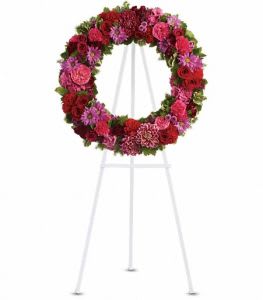 Circular floral wreath on a standing easel