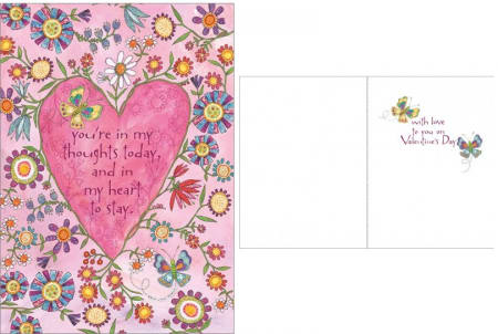 Pink Valentine card with a heart and flowers, plus a matching envelope