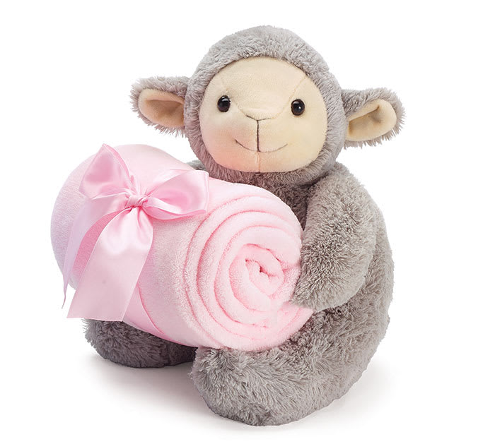Plush gray lamb holding a pink rolled blanket with a ribbon