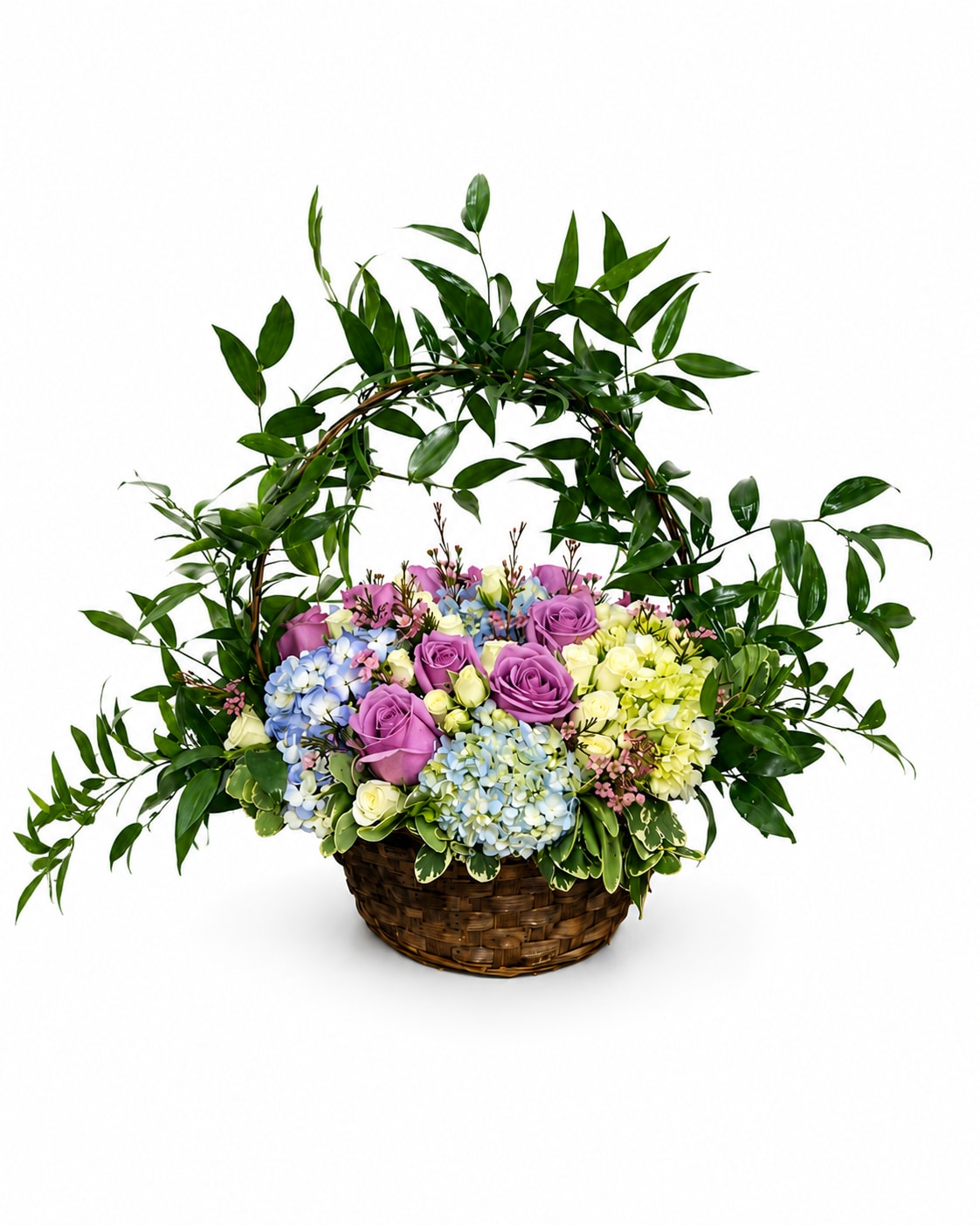 Roses &amp; Hydrangea Basket - Even in mourning it is important to remember and honor a life well lived. This beautiful basket of purple and white flowers blended with vibrant greenery is a wonderful way to pay tribute to one who has indeed lived a full life.  T211-1A