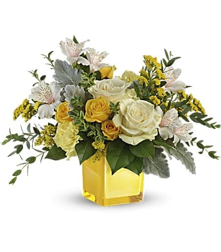 Teleflora's Sweet Sunlight Bouquet - Bring sunshine to any occasion with this radiant bouquet of classic white roses and cheery yellow blooms! Arranged in a sunny keepsake cube, it's a gift that keeps on giving. 