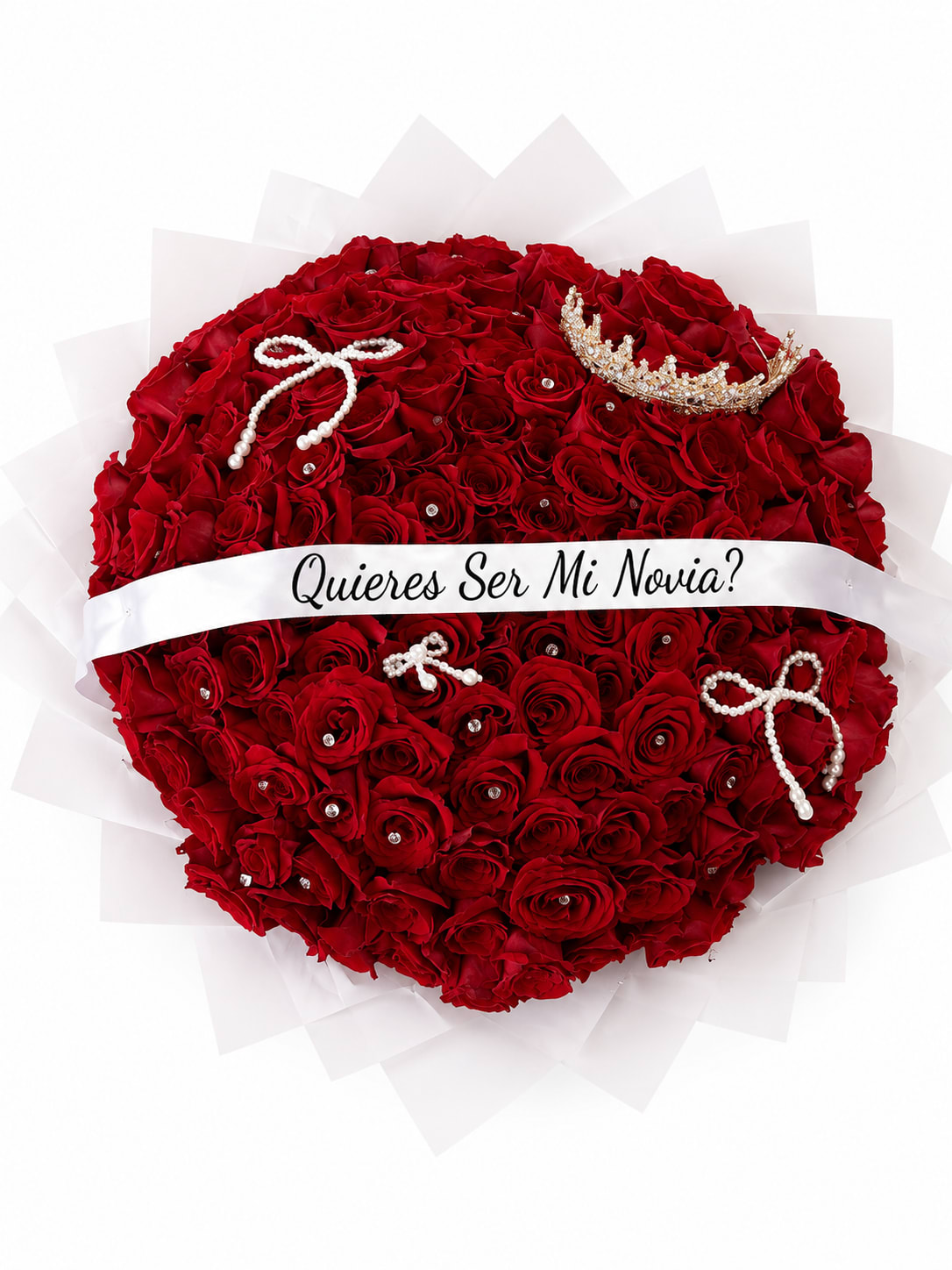 Heart-shaped bouquet of red roses with a white ribbon and jeweled accents