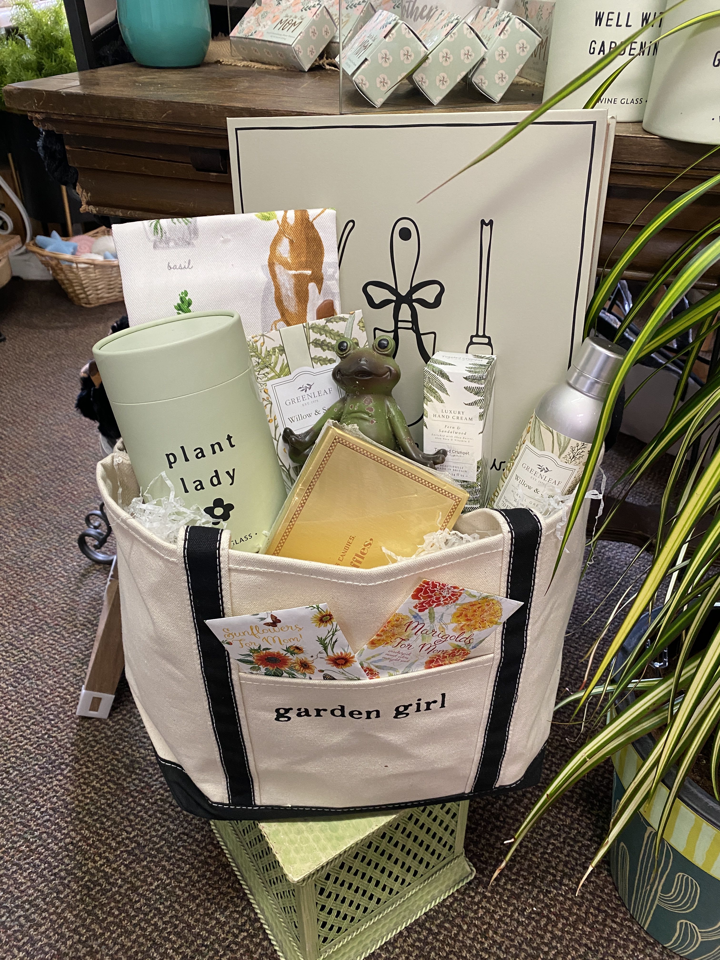 Garden-themed gift tote with plant and floral items