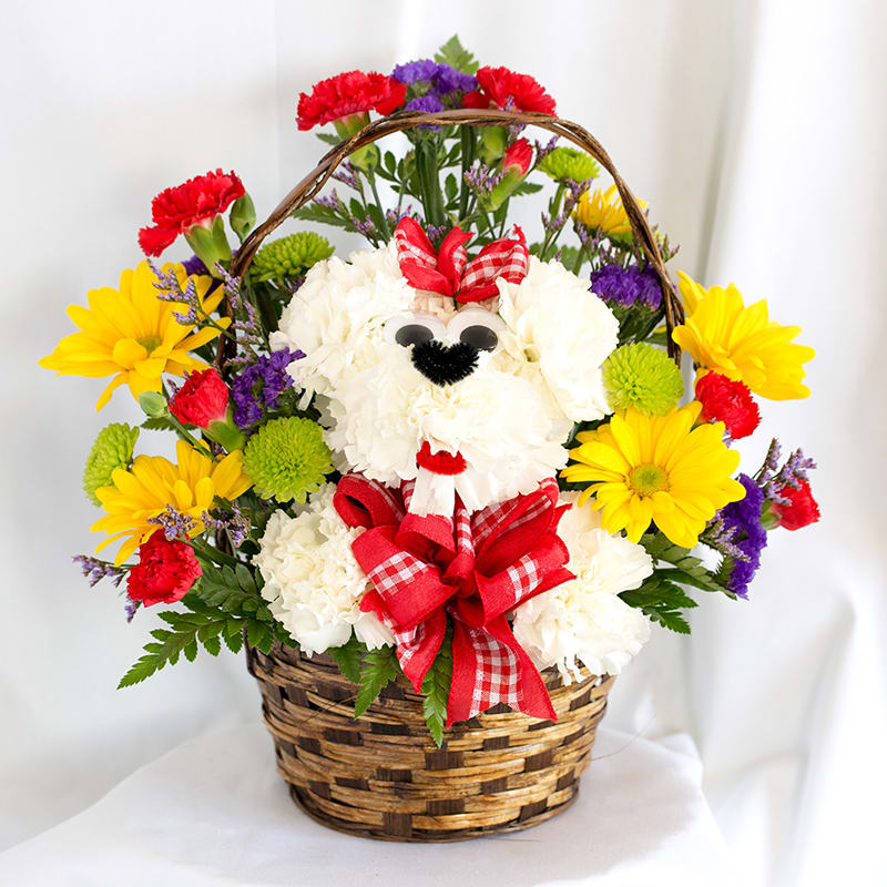 Basket arrangement with a teddy bear made of white flowers and colorful blooms