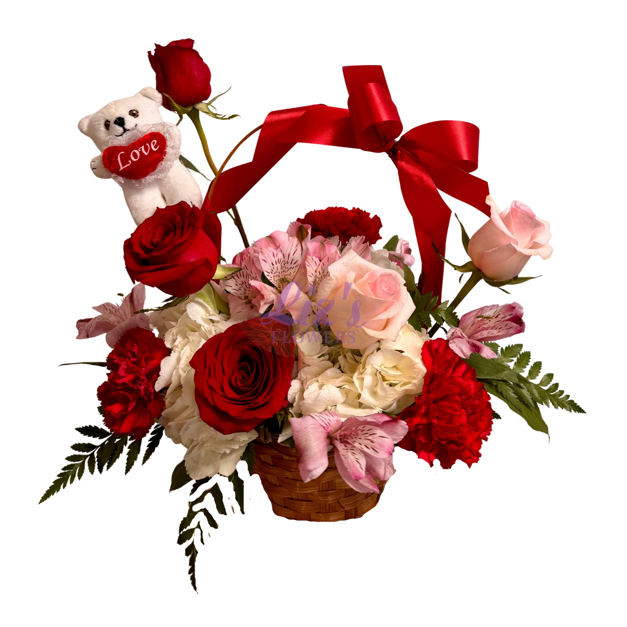 Basket of red and pink roses with a teddy bear and red ribbon