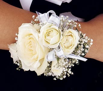 White rose wrist corsage with baby's breath and ribbon