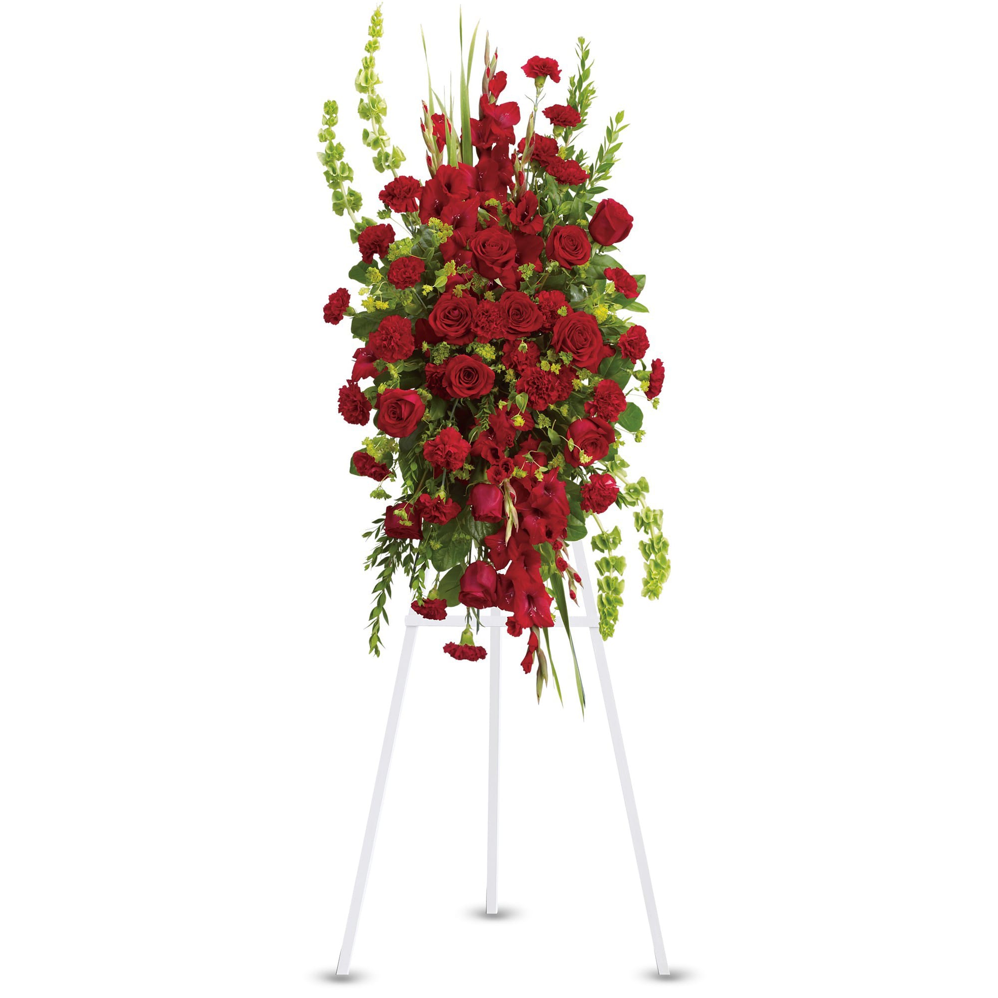 Care and Compassion Spray by Teleflora - Your care and compassion will be appreciated by all who lay eyes on this radiant standing spray. A variety of lovely vibrant red blossoms contrasted by vivid green of bells of Ireland will deliver your heartfelt condolences. Perfectly.  