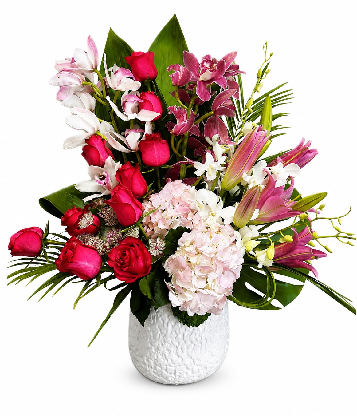 Love Expression - A luxurious arrangement of elegant pink and red roses, fragrant lilies, lush hydrangeas, and graceful orchids, accented with premium greenery in a stylish ceramic vase. This sophisticated floral design is perfect for celebrating love, anniversaries, birthdays, or adding timeless elegance to any occasion.