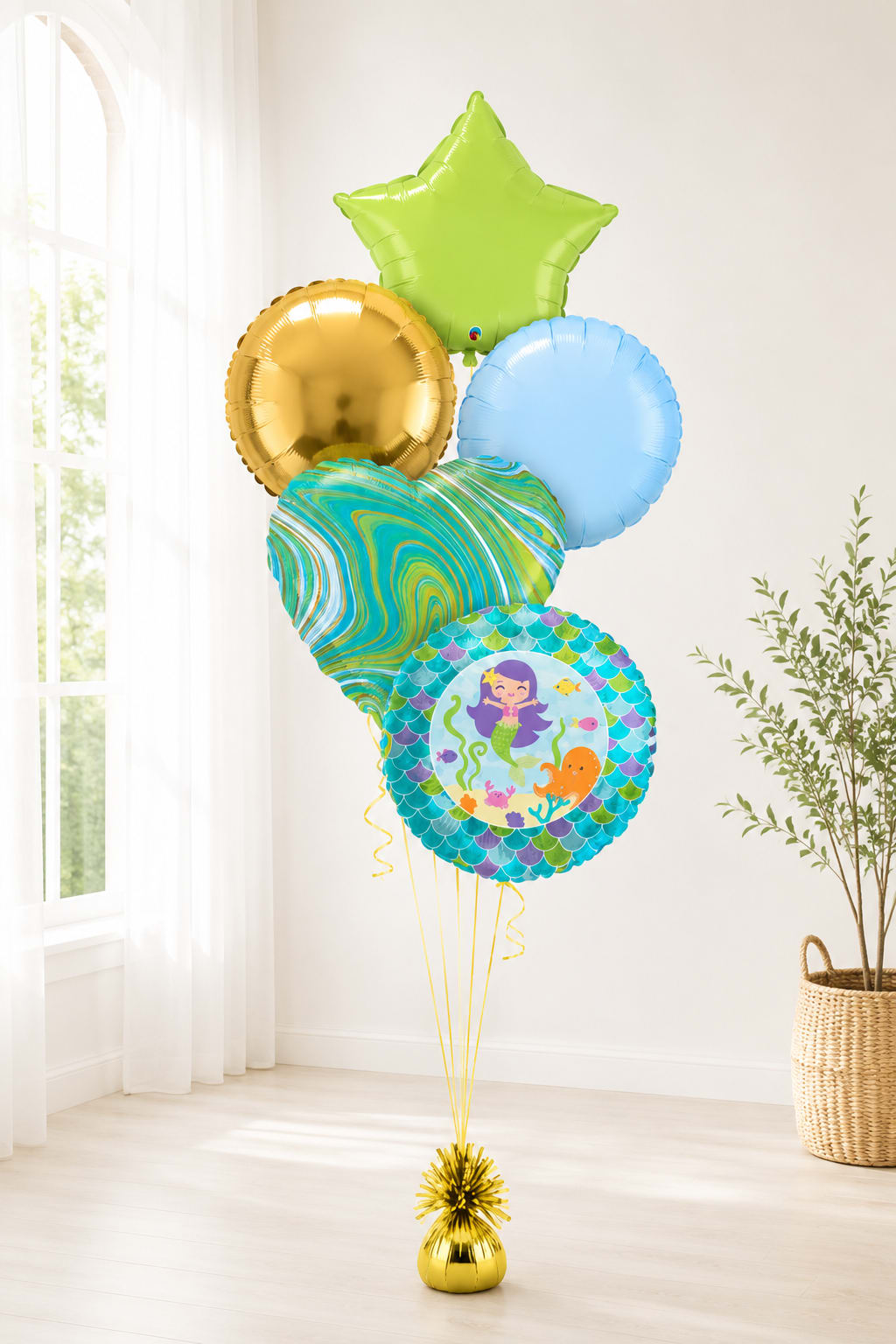 Cluster of colorful helium balloons with a mermaid design and star balloon